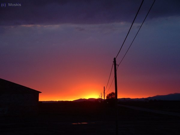 almenys gaudim de la posta de sol